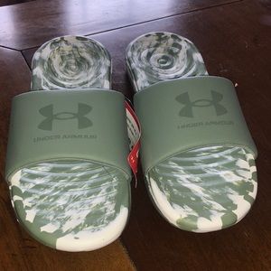 Under Armour slides size 9 NWT’s